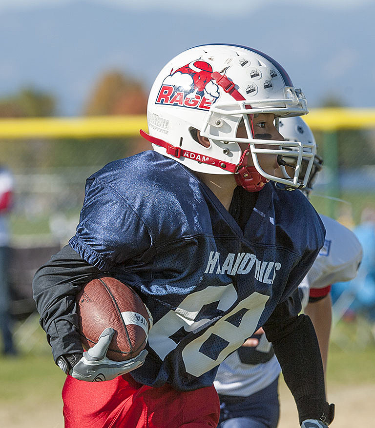Football player, running with the ball.